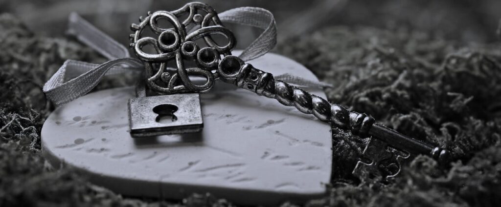 Consistency is key in romantic relationships. A heart and a key to demonstrate the importance of consistency in Love.