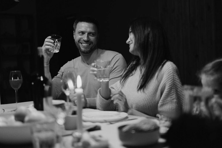 Couple enjoying drinks at dinner